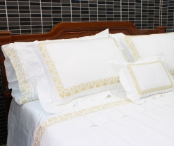 Gold lotus flowers embroidered bedding set with hemstitch